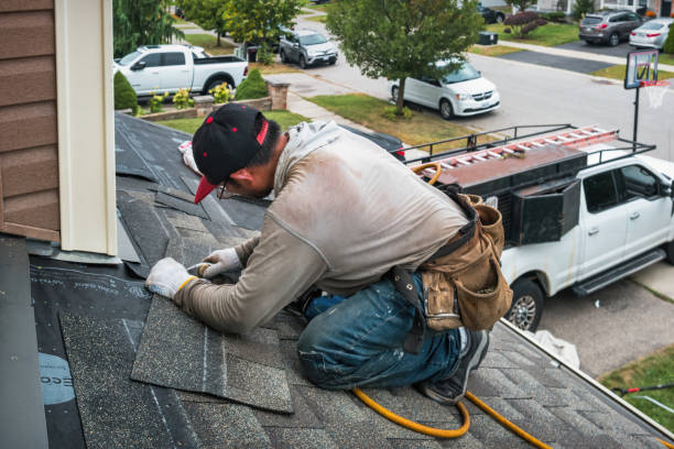 Professional Roofing technician working in East Falmouth, MA